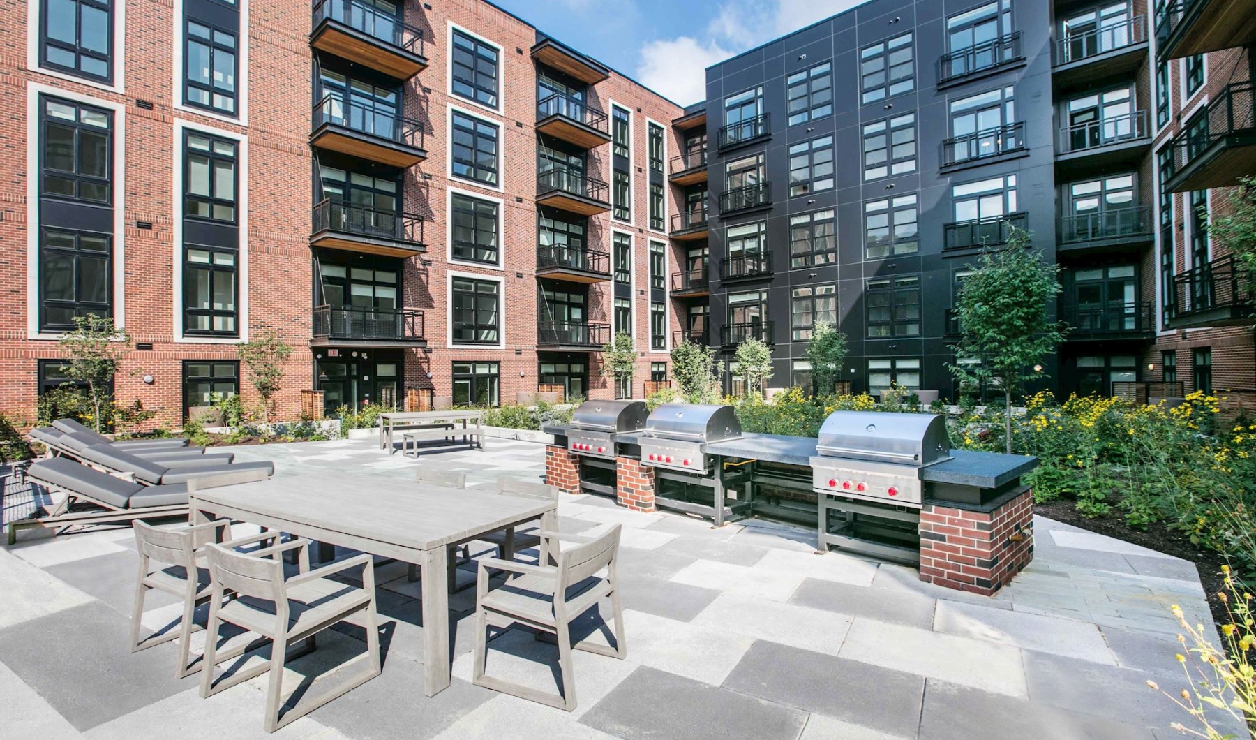Exterior Courtyard Exterior courtyard with grills and dining tables