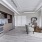 Spacious and well lit kitchen with wood floors and stainless steel appliances 